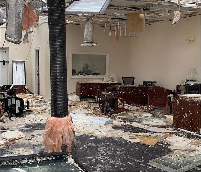 Ceiling collapsed in a building, debris on the floor