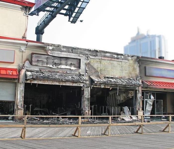 Exterior of a business with fire damage.