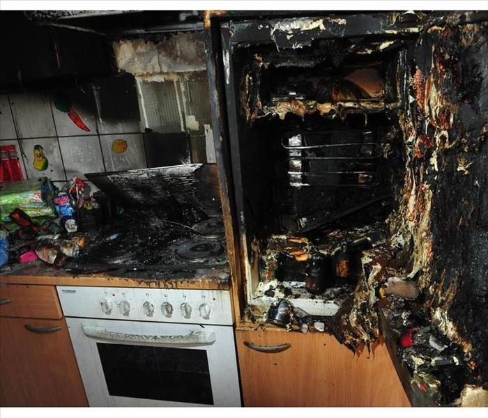 Burned kitchen after fire caused by cigarettes
