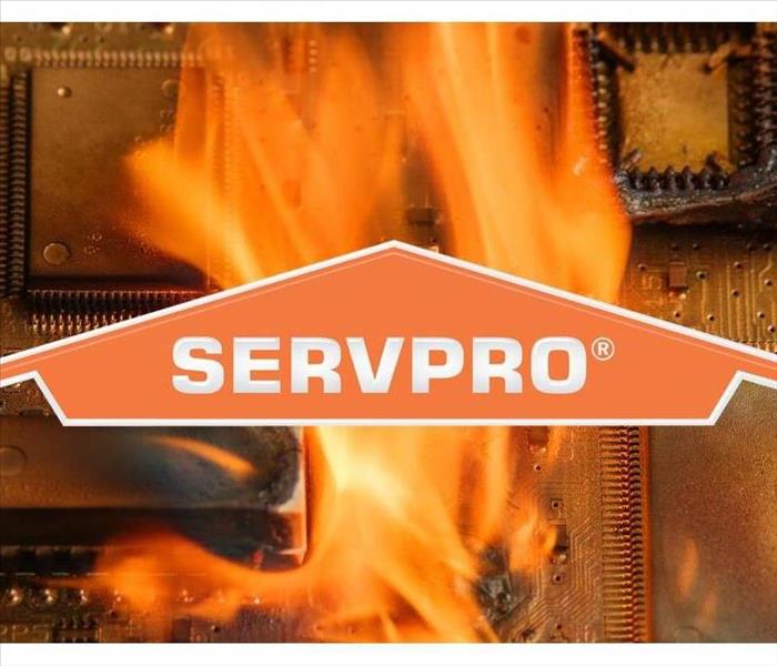 SERVPRO logo with flames behind it